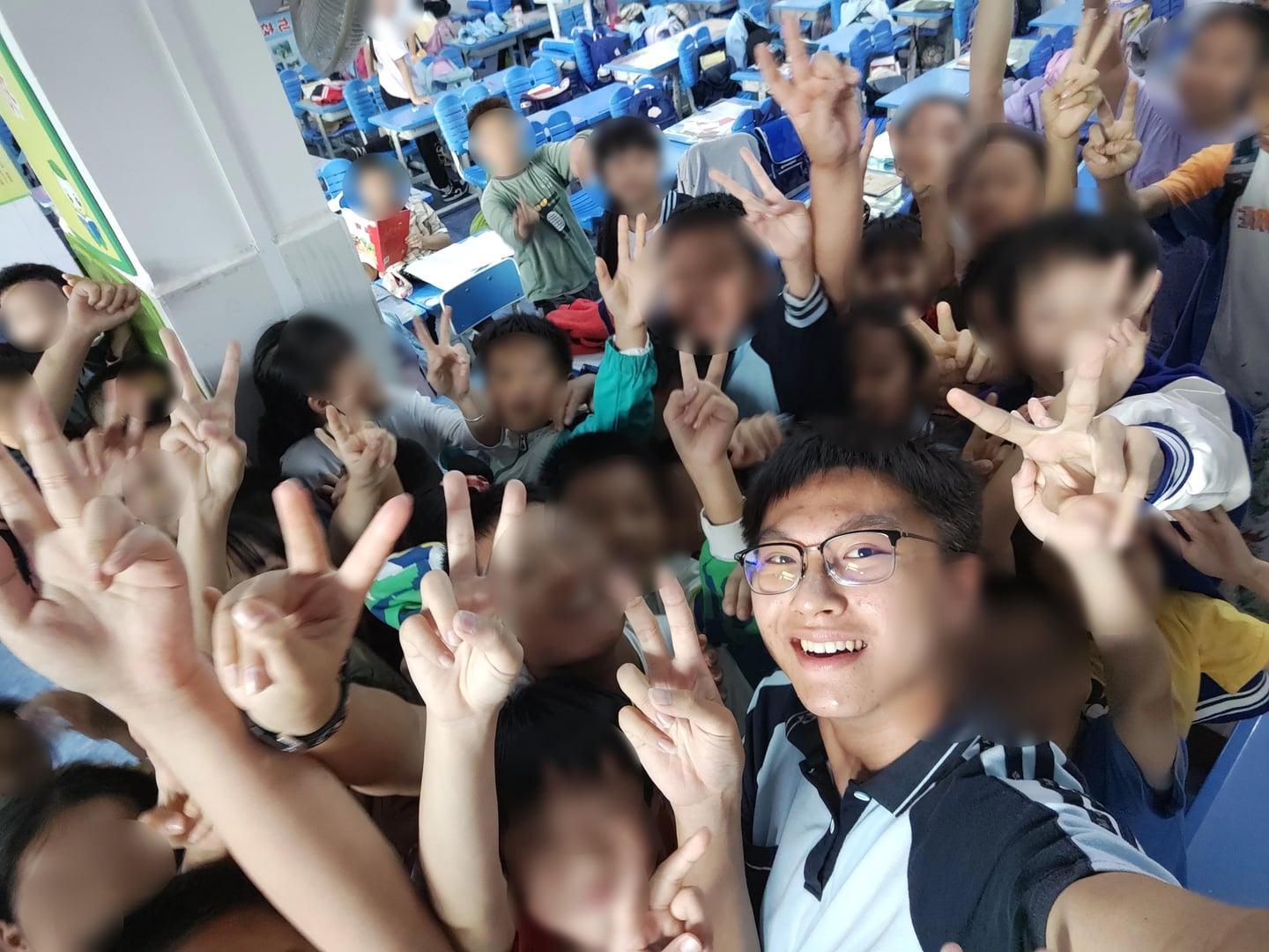 Andy with rural children after a dyslexia screening session.